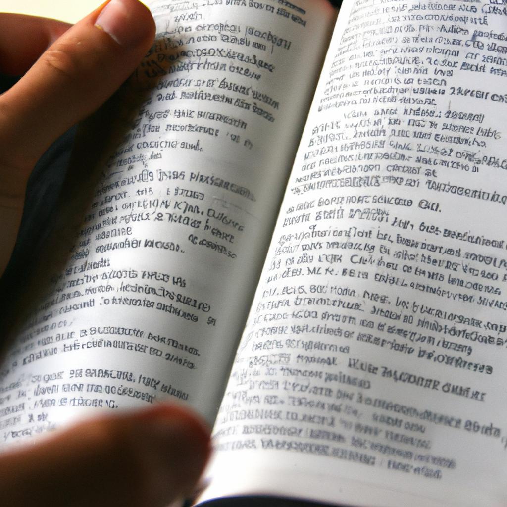 Person holding dictionary, reading values